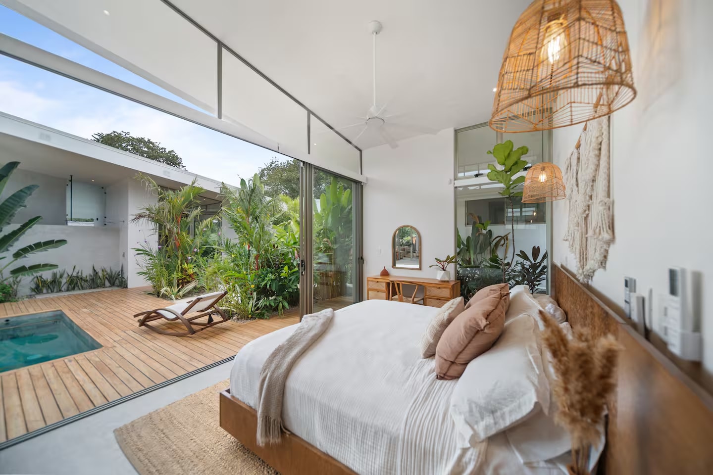 Master bedroom opening directly onto the pool deck