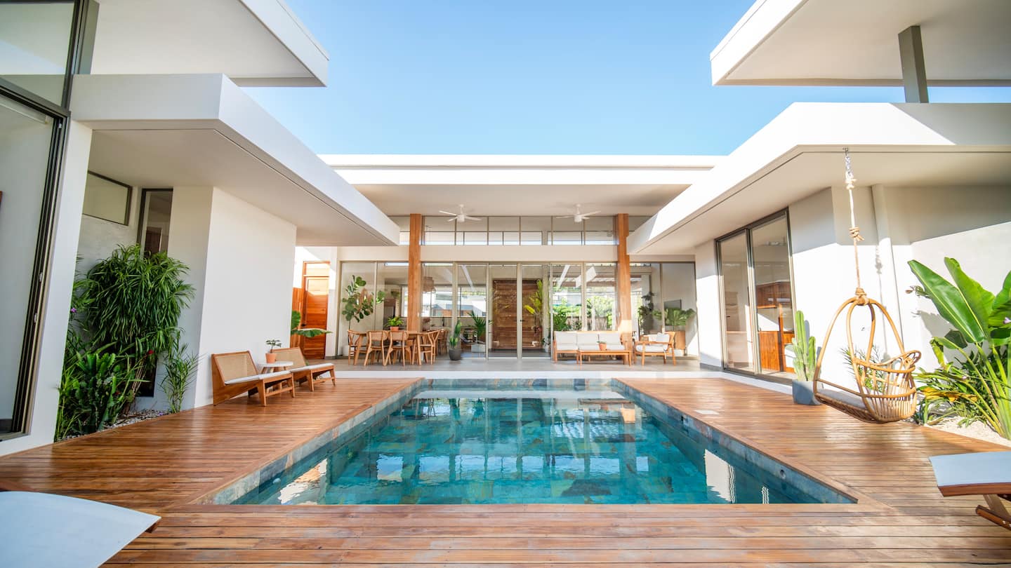 Private pool and teak deck with full villa facade