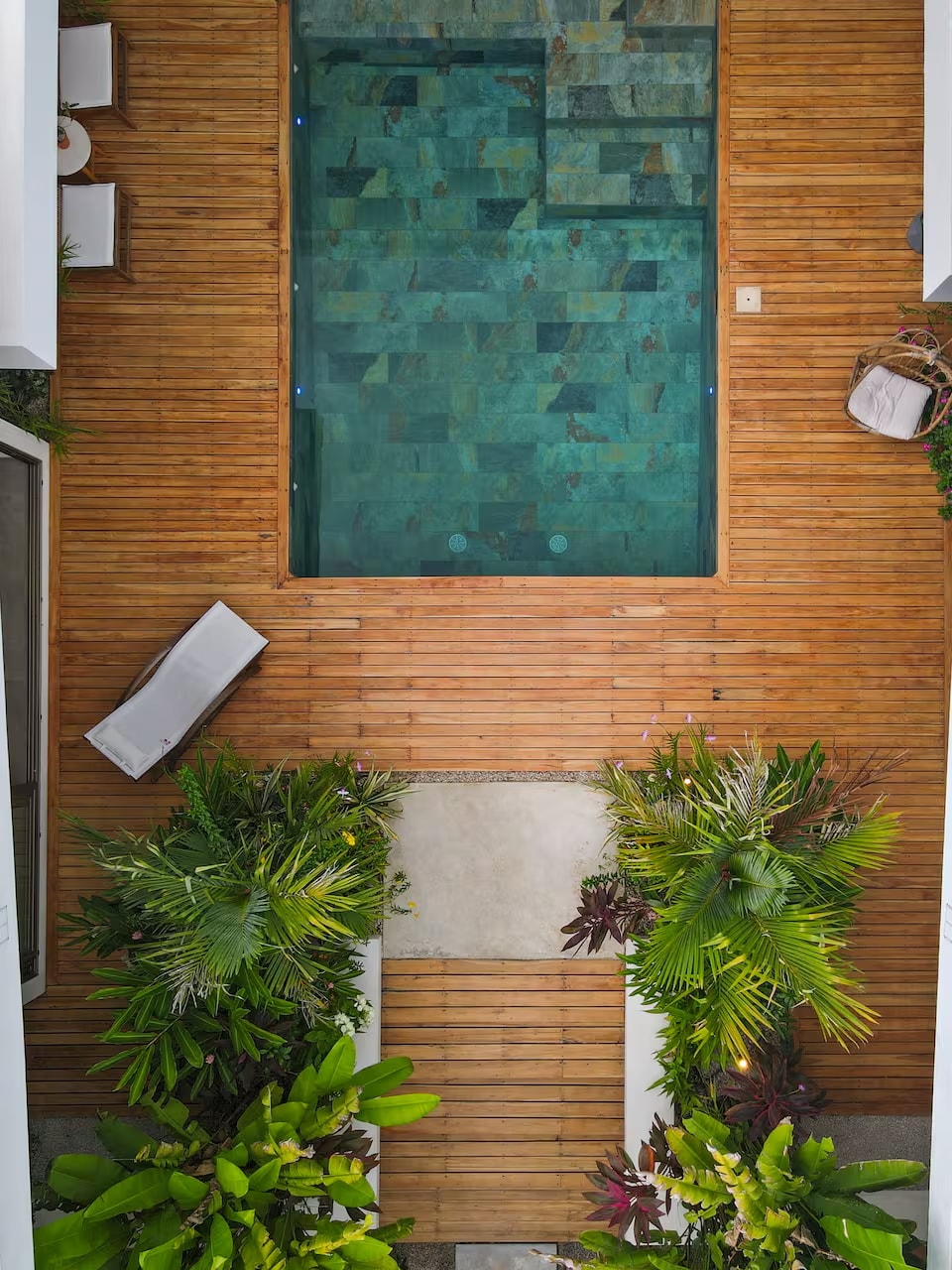 Overhead aerial view of the Casa Mavericks teak pool deck and tropical gardens